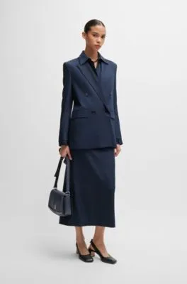 Bolso de piel con solapa, herrajes de la marca y monograma